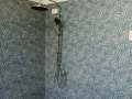 shower-assembly-on-palm-tiles-at-the-shower-room