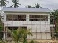 super-wide-front-windows-and-open-ground-floor-for-a-farm-type-house