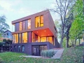 modern villa with rustic cottage accent