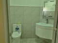 Maters-bathroom-with-lights-on-and-newsly-installed-wash-basin