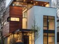 wood and black metal contrasts with with wide white frontage